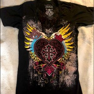 Women’s graphic tops size large. Brand is Archaic.